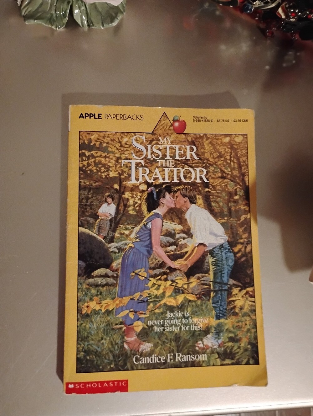 Paperbacks Yellow Back-Cover with Small Portrait and Apple Logo